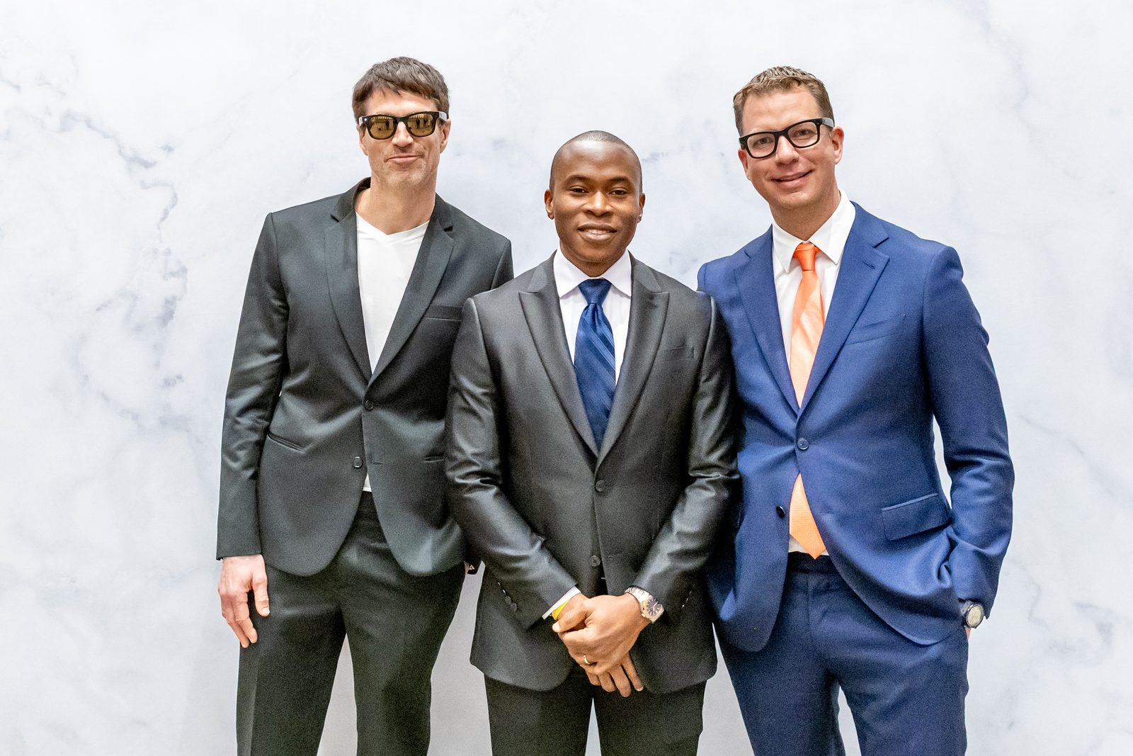 Erik Simons (left) and JT Foxx (right) with Aniemi Umana